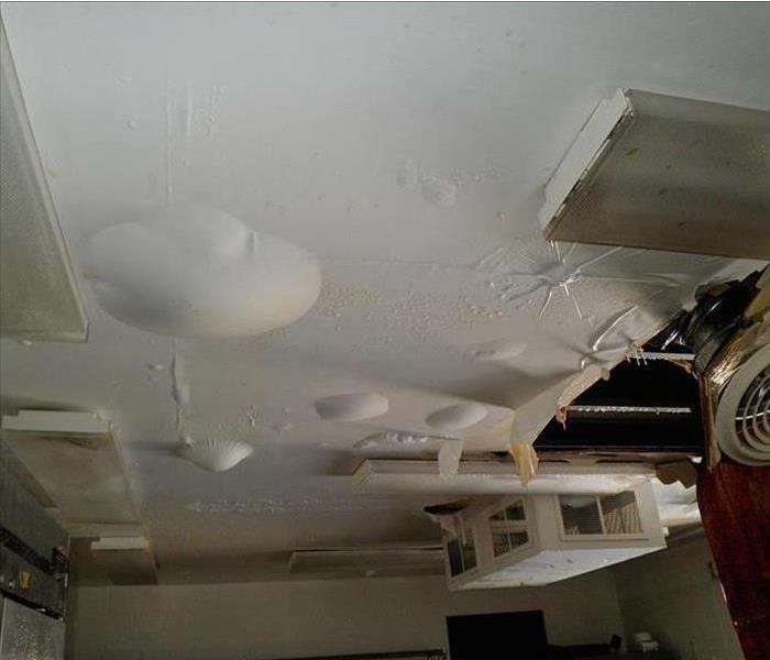 removed ceiling, replaced looking new, white