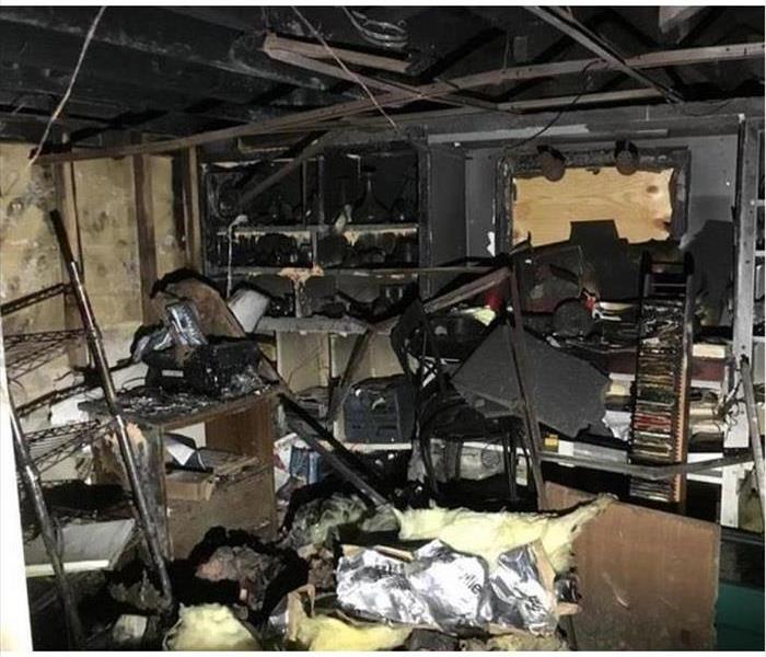 hire damaged room; fire damaged belongings shown in room